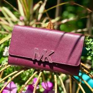 Michael Kors trifold plum wallet